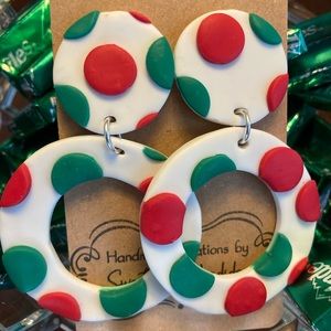 White Dangle earrings with red and green polka dots.